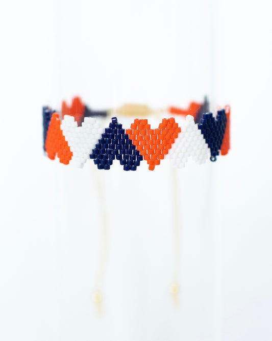 The Navy, Orange, and White Claire